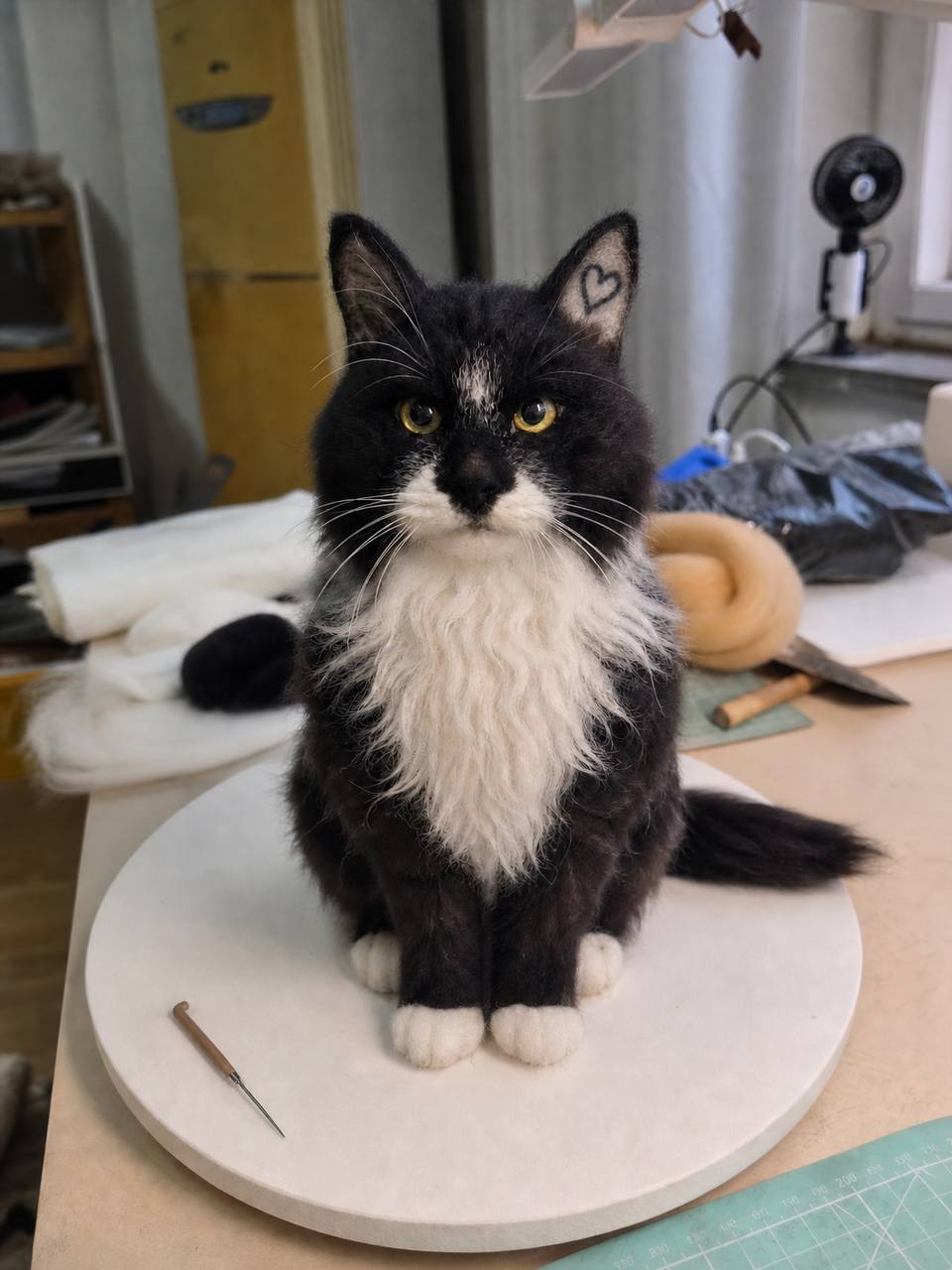 Finished handmade wool sculpture of Taylor Ogle's cat by FurFelt Creations